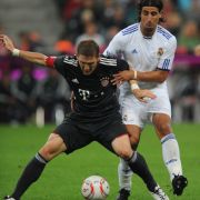 Im DFB-Team ein kongeniales Duo, in der Champions League direkte Rivalen: Bastian Schweinsteiger und Sami Khedira. Im DFB-Team ein kongeniales Duo, in der Champions League direkte Rivalen: Bastian Schweinsteiger und Sami Khedira.