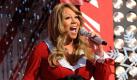 In this publicity image released by Disney, Grammy Award-winning singer Mariah Carey performs during a taping of the Disney Parks Christmas Day Parade special, Friday, Dec. 3, 2010, at the Magic Kingdom in Lake Buena Vista, Fla. The annual holiday telecast will air on Dec. 25, on ABC. (AP Photo/Disney, Mark Ashman) Foto: ap