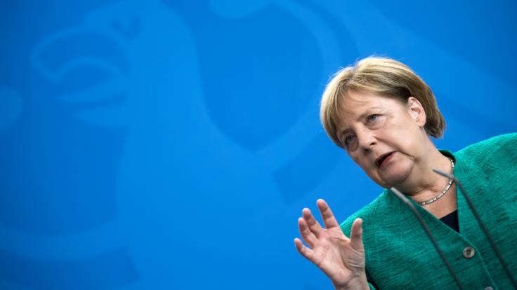 Angela Merkel forderte, dass jeder Deutsche Stellung gegen Rechts beziehen sollte.