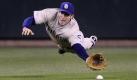Einen spektakulärer Fang entgeht Baseballer Chris Denorfia von den San Diego Padres. Foto: ap