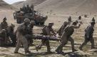 US-Soldaten im Afghanistaneinsatz tragen einen verwundeten Kameraden.US-Soldaten im Afghanistaneinsatz tragen einen verwundeten Kameraden. Foto: ap