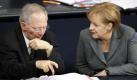 Finanzminister Wolfgang Schäuble und Kanzlerin Angela Merkel brennen auf die CD. Doch nicht alle Parteikollegen sind mit ihnen einer Meinung. Foto: dpa