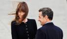 Der französische Präsident Nicolas Sarkozy und die First Lady Frankreichs, Carla Sarkozy, warten auf den chinesischen Präsidenten Hu Jintao, der am Flughafen in der Nähe von Paris ankommt. Hu Jintao wird für drei Tage das Land besuchen. Am Nachmittag gibt es eine Unterredung zwischen ihm und Sarkozy im Elysee Palast. Foto: dpa