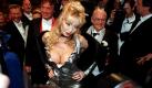 Porn actress and producer Dolly Buster is in the centre of limelight as she arrives at the famous Vienna Opera Ball, 11 February 1999. Austria's elite put on their glad rags for the ball Thursday night, but the event risked being clouded by an attack on guests who might 'tarnish' the ball's reputation. dpa Foto: dpa