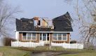 Bei James Shaffers Farmhaus in Union County, Kentucky, haben die Tornados einfach zugebissen auf ihrem zerstörerischen Weg von der Golfküste bis zu den großen Seen. Foto: dapd