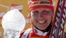 Kati Wilhelm hatte sportlich gesehen schon erfolgreichere Winter. Im Verfolgungsweltcup freute sie sich ber Gesamtrang drei. Die rotenHaare stehen ihr ausgesprochen gut. Foto: dpa