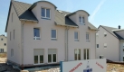 Das traute Heim, Glück allein? Immer weniger Deutsche bauen ihr eigenes Haus. Nach einem Bauboom in den 1990er Jahren wird nur noch in den Randlagen von Großstädten im großen Stil neu gebaut. Gleichwohl ist der Bau von Eigenheimen immer noch der größte Umsatzbringer der Bauindustrie. Foto: dpa