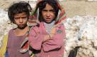 Gezeichnet von der Kälte: Afghanische Kinder in einer Notunterkunft für Flüchtlinge in Kabul. Im vergangenen Monat starben wegen der klirrenden Kälte 22 Kinder. Das Land erlebt derzeit einen harten Winter, in denen Tagestemperaturen von minus 15 Grad Celsius und mehr herrschen. Foto: S. Sabawoon Foto: dpa
