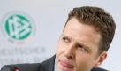 Oliver Bierhoff warnt die Nationalspieler vor dem Schlendrian. Foto: dpa