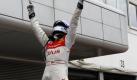 10. DTM-Lauf auf dem Adria International Raceway in Adria, Italien: Der deutsche Audi-Pilot Timo Scheider jubelt im Ziel auf dem Dach seines Autos. 
 Foto: dpa