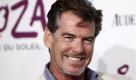 Actor Pierce Brosnan arrives for the Opening Night Gala for KOOZA, the big top touring show from Cirque du Soleil, in Santa Monica, Calif. on Friday, Oct. 16, 2009.  (AP Photo/Matt Sayles) Foto: ap