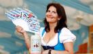 Melanie Reis von der Presseabteilung des Münchner Oktoberfestes, präsentiert in einem Festzelt auf der Theresienwiese den Wiesn-Masskrug 2011 und einen Fächer mit der Aufschrift «I mog di». Das Oktoberfest 2011 findet vom 17. September bis 3. Oktober statt.  Foto: dapd