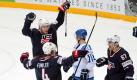 Die US-Boys zogen durch dem Sieg gegen Finnland ins Viertelfinale ein. Foto: Kimmo Brandt Foto: dpa