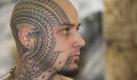 Nicht jedermanns Sache: Julien Ruiz aus Frankreich präsentiert seine Körperbemalung auf der 21. Internationalen Tattoo Convention in Berlin. In der Hauptstadt sind derzeit Über 200 Tätowierer, davon 180 aus dem Ausland. Foto: Sebastian Kahnert  Foto: dpa