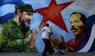 In der Haupstadt Managua zeichnet ein Mann die Porträts von Nicaraguas Präsident Daniel Ortega (r.) und dem ehemaligen Präsident von Cuba, Fidel Castro, an eine Mauer. Foto: ap