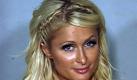 ** RETRANSMISSION FOR TONE QUALITY ** In this photo released Saturday, Aug. 28, 2010 by the Las Vegas Metropolitan Police Department, Paris Hilton poses for a police booking photo in Las Vegas. Paris Hilton was arrested late Friday after a police motorcycle officer smelled marijuana smoke wafting from a black Cadillac Escalade driven by her boyfriend on the Las Vegas Strip, then found cocaine in her purse, authorities said. (AP Photo/Las Vegas Metropolitan Police Department) Foto: ap