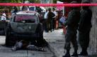 Die brutale Seite Mexikos: Die Polizei in Acapulco sichert einen Tatort. Zwei Menschen fielen dem Drogenkrieg zum Opfer. Täglich sterben Menschen in dem Krieg zwischen den Banden um die Vorherrschaft im Drogenhandel. Foto: dapd