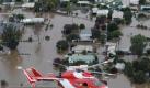Ein Hubschrauber über dem Flutgebiet in New South Wales. Foto: Andrew Meares Foto: dpa
