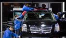 Vorbereitungen in Detroit: Ein Cadillac Escalade wird für die Autoshow poliert. Foto: dpa