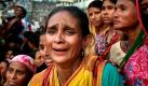 A Bangladeshi woman who lost her daughter reacts at the site of a building collapse in Dhaka, Bangladesh, Wednesday, June 2, 2010. A four-story apartment building collapsed in Bangladesh's capital and its debris buried some nearby shanties, killing at least 10 people and leaving several others trapped, authorities said Wednesday. (AP Photo/Pavel Rahman) 



 Foto: ap/ Pavel Rahman