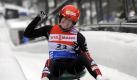 Corinna Martini jubelt in Winterberg nach ihrem Sieg. Foto: Marius Becker Foto: dpa