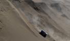 ** CORRECTS NAME OF CO-DRIVER TO SERGEI SAVOSTIN ** Kamaz's driver Vladimir Chagin and co-driver Sergei Savostin, both from Russia, compete during the seventh stage of the Argentina-Chile Dakar Rally 2010 between Iquique and Antofagasta, Chile, Friday, Jan. 8, 2010. (AP Photo/Natacha Pisarenko) Foto: ap