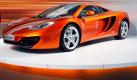 The new McLaren MP4-12C Automotive is seen at it's unveiling at the McLaren Technology Centre in Woking, England, Thursday, March 18, 2010. Manufacturing of the car will begin in spring 2011, and the car will cost between 125,000- 175,000 Pounds (190,000-270,000 US Dollars).(AP Photo/Kirsty Wigglesworth)  Foto: AP