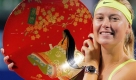 Maria Sharapova of Russia holds the trophy after the final match against Jelena Jankovic of Serbia at the Pan Pacific Open tennis tournament in Tokyo, Japan, Saturday, Oct. 3, 2009. Former No. 1-ranked Sharapova won her first tournament since returning from a 10-month injury layoff when Jankovic was forced to retire in the first set. Jankovic retired with an injured right arm trailing 5-2 in the first set. (AP Photo/Itsuo Inouye) Foto: ap