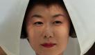 A bride in a traditional white headgear pauses during her wedding at Meiji shrine in Tokyo Saturday, Sept. 10, 2011. (AP Photo/Itsuo Inouye) Foto: dapd