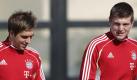 Kapitän Philipp Lahm (l) sieht die Bayern auf einem guten Weg - auch in der Champions League. Foto: Karl-Josef Hildenbrand Foto: dpa