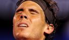 Der Spanier Rafael Nadal ärgert sich über den Ausgang des Matches gegen seinen Landsmann David Ferrer bei den Australian Open in Melbourne. Ferrer gewann in allen drei Sätzen.  Foto: dpa