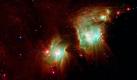 Die Nasa hat dieses Bild von der Galaxie Messier 78 im Sternbild Orion aufgenommen. Die Galaxie ist ein Paradebeispiel für einen sogenannten Reflexionsnebel. Das Licht der Sterne streut an Staubteilchen in der Nebelwolke und verleiht dem Objekt so einen grünlichen Farbton. Auf der Außenseite des Nebels sind zahlreiche Baby-Sterne zu sehen. Foto: dapd