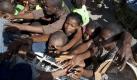 Haitianer bei der Nahrungsmittelausgabe in Port-au-Prince. Foto: dpa