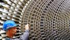 Mechaniker während der Arbeit beim Turbinenhersteller MAN-Turbo: Deutschland exportierte Waren im Gesamtwert von 98,9 Milliarden Euro. Foto: Oliver Berg/Archiv Foto: dpa
