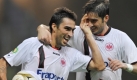 Die Frankfurter Chris (l) und Nikos Liberopoulos jubeln nach dem Tor zum 3:1 gegen Aachen. Alemannias Lukas Szukala hatte in der 45. Minuten per Eigentor für die Gastgeber erhöht. Foto: dpa
