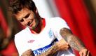 Englands Ex-Kapitän David Beckham macht sich im südafrikanischen Rustenburg für eine Trainingseinheit warm.  Das englische Nationalteam bereitet sich hier auf das nächste WM-Spiel gegen Algerien am 18. Juni vor. Foto: dpa