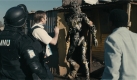 Die MNU-Einheit fordert alle Aliens auf, District 9 zu verlassen. Foto: Sony Pictures Releasing GmbH