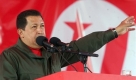 In this photo released by Miraflores Press Office, Venezuela's President Hugo Chavez delivers a speech during a ceremony in Caracas, Sunday, Nov. 30, 2008. Chavez asked supporters Sunday to petition for a constitutional amendment that would let him seek indefinite re-election and buy more time to build a socialist economy in Venezuela.(AP Photo/Miraflores Press Office) Foto: ap