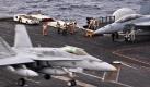 An Deck des Flugzeugträgers USS Enterprise (CVN 65), der in den letzten Tagen näher an die libysche Küste versetzt wurde. Foto: dpa