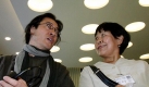 Die China-kritischen Autoren Bei Ling (inks) und Dai Qing vor Beginn eines Symposiums. Foto: dpa
