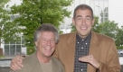 Doch Schumacher, hier mit Rennsportlegende Mario Andretti, soll sich laut Staatsanwaltschaft sein schnelles Hobby mit Schmiergeld von seinem Geschäftspartner Ralf Udo Schneider finanziert haben. Foto: ddp