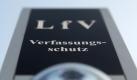 Türklingel mit integrierter Überwachungskamera im Eingangsbereich eines Landesamtes für Verfassungsschutz. Foto: Fredrik von Erichsen Foto: dpa