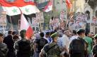 Polizisten und Assad-Anhänger bei einer Demo in Beirut. Zur libanesischen Regierung gehört die mit Damaskus kooperierende Hisbollah-Bewegung. Foto: Wael Hamzeh Foto: dpa