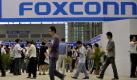 Beim weltweit größten Elektronik-Hersteller Foxconn stürzte sich erneut ein Mitarbeiter vom Dach des Werkes im südchinesischen Shenzhen. Es war der neunte Todesfall und elfte Sturz dieser Art in der Fabrik in diesem Jahr. Foto: dpa
