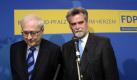 Enttäuschung pur: FDP-Landeschef und Bundeswirtschaftsminister Rainer Brüderle und der rheinland-pfälzische Spitzenkandidat Herbert Mertin nach Bekanntgabe der ersten Hochrechnungen. Brüderle bezeichnete das Ergebnis als bittere Niederlage. Es sei eine Aufforderung zum Nachdenken. Jetzt müsse die Lage sorgfältig analysiert werden. Foto: dpa