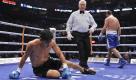Der kanadische Boxer Eric Lucas verzieht sich in seine Ecke, nachdem er den Argentinier Ramon Pedro zu Boden geschickt hat. Foto: ap