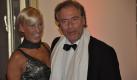 Promi-Agent Rainer C. Herzmann und Begleiterin Elke Bartsch beim Opernball auf dem roten Teppich. Foto: news.de
