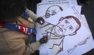 A Tibet Freedom Movement activist makes a portrait of U.S. President Barack Obama with his blood in Shimla, India as he thanks him for agreeing to meet the Dalai Lama, Thursday, Feb. 4, 2010. China on Wednesday again urged Obama not to hold a planned meeting with Dalai Lama, saying it would further hurt already strained bilateral relations. According to Chhime R. Chhoekyapa, the Dalai Lama's secretary, the Dalai Lama will be in Washington on Feb 17-18. (AP Photo/ Anil Dayal) ** zu unserem KORR. ** Foto: ap