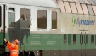 Im Seehafen Rostock wird am Freitag (10.06.2005) ein historischer Aussichtswagen des einstigen Express-Zuges 'Rheingold' nach seiner Ankuft aus Schweden rangiert. Insgesamt drei dieser Wagen wurden von der DB Nostalgiereisen in Rostock in Empfang genommen. Die 43 Jahre alten Wagen wurden 1976 durch die damalige Deutsche Bundesbahn verkauft und gelangten später in schwedischen Besitz. Von den Aussichtswagen mit dem doppelstöckigen verglasten Mittelteil wurden nur fünf Stück gebaut. Käufer der drei Aussichtswagen aus Schweden ist die Vulkaneifelbahn GmbH aus Gerolstein, die mit den historischen Wagen Schienenkreuzfahrten veranstalten will. Foto: Bernd Wüstneck dpa/lmv/lrs +++(c) dpa - Bildfunk+++ Foto: dpa