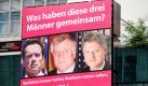 Eine Werbeanzeige des Internetportals Ashley Madison.com mit den Köpfen des ehemaligen Gouverneurs des US-Bundesstaats Kalifornien, Arnold Schwarzenegger (links), des bayerischen Ministerpräsidenten Horst Seehofer (CSU, Mitte) und des ehemaligen US-Präsidenten Bill Clinton hängt in Berlin an einem Gebäude am Alexanderplatz. Das Internet-Portal will Seitensprünge und Kontakte zum Fremdgehen vermitteln.  Foto: dapd
